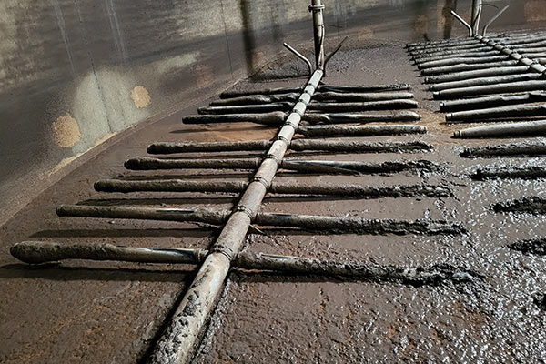 Réseau d'aération d'un bassin d'aération à réhabiliter